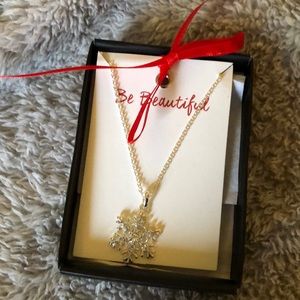 Brand new AVON snowflake necklace